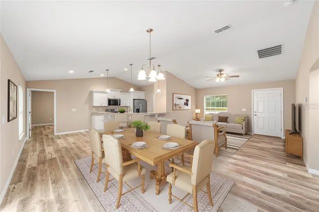 a view of a dining room with furniture