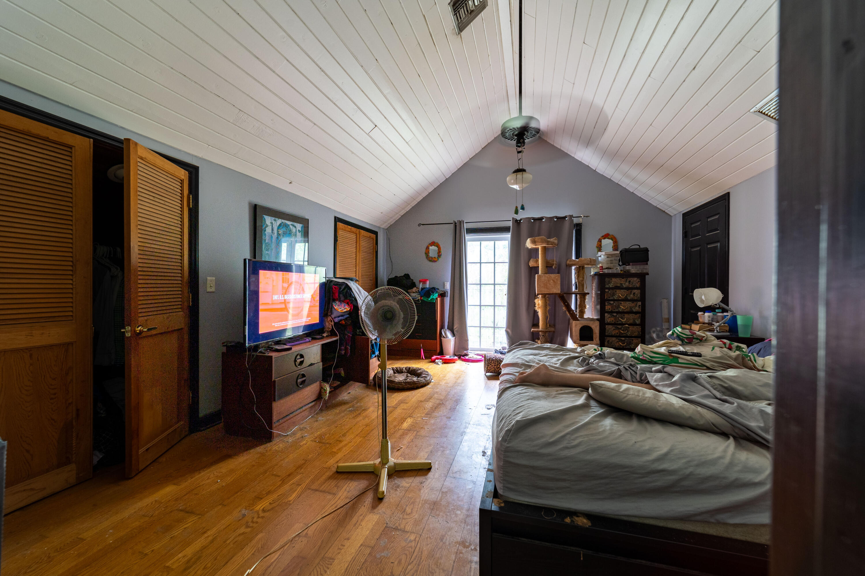 15184 Alexander Run Jupiter, FL 33478 - Photo 15 of 35 a living room with furniture fireplace and a flat screen tv