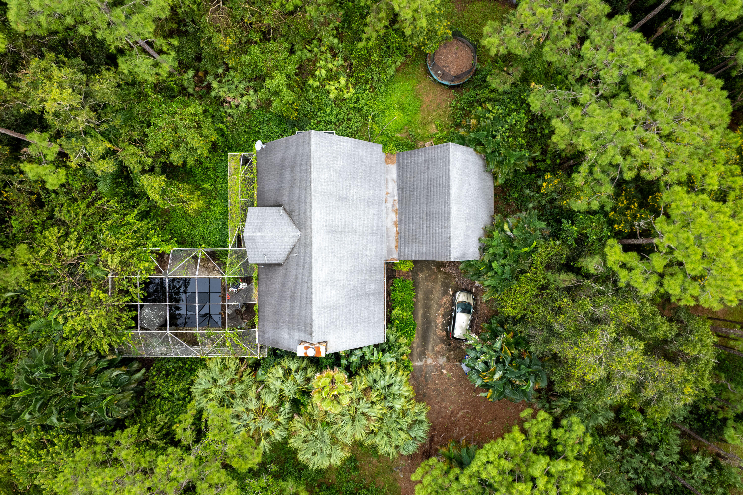 15184 Alexander Run Jupiter, FL 33478 - Photo 35 of 35 an aerial view of a house with a yard and garden