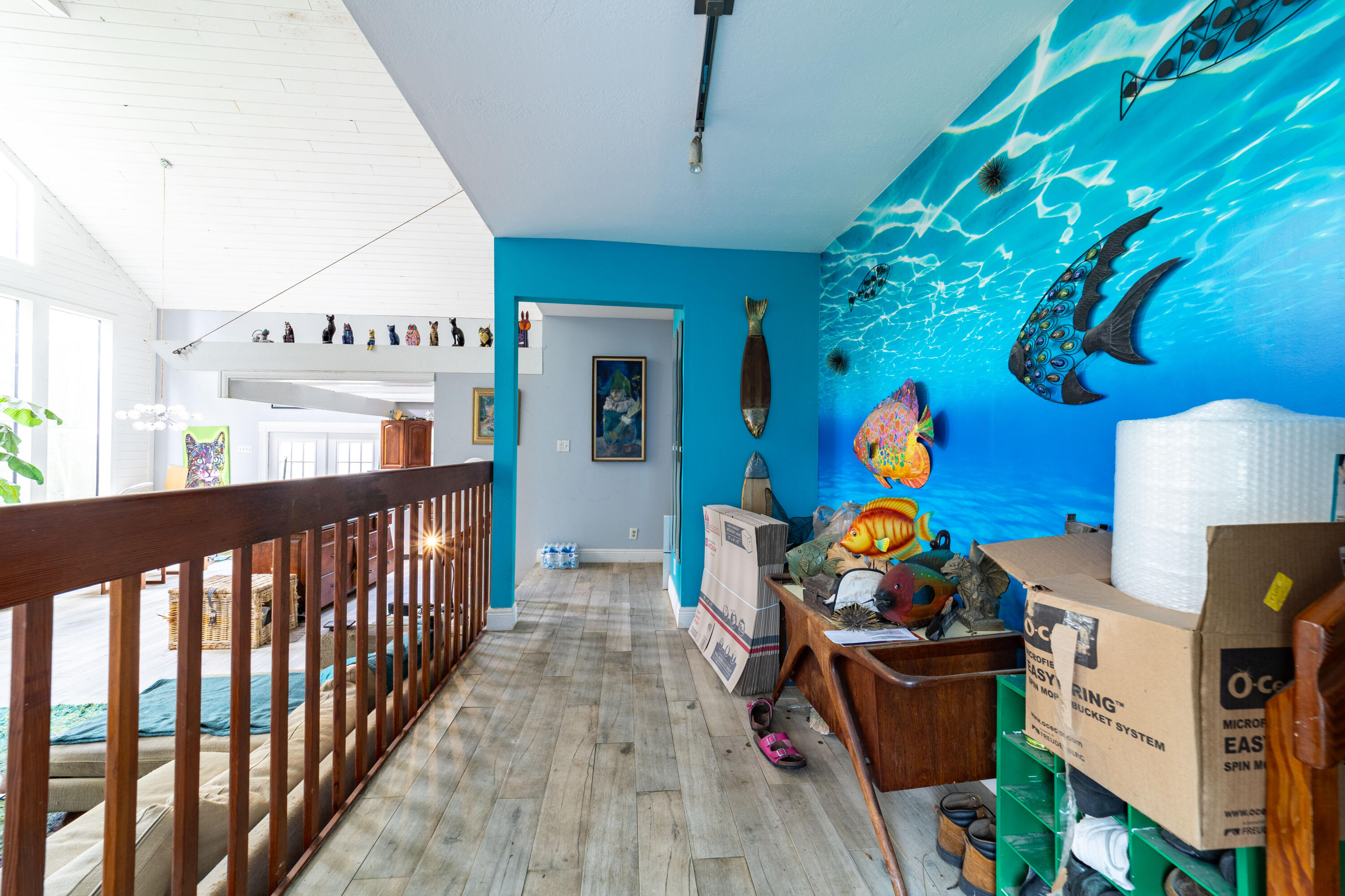 15184 Alexander Run Jupiter, FL 33478 - Photo 4 of 35 a view of a dining room with furniture a chandelier and wooden floor