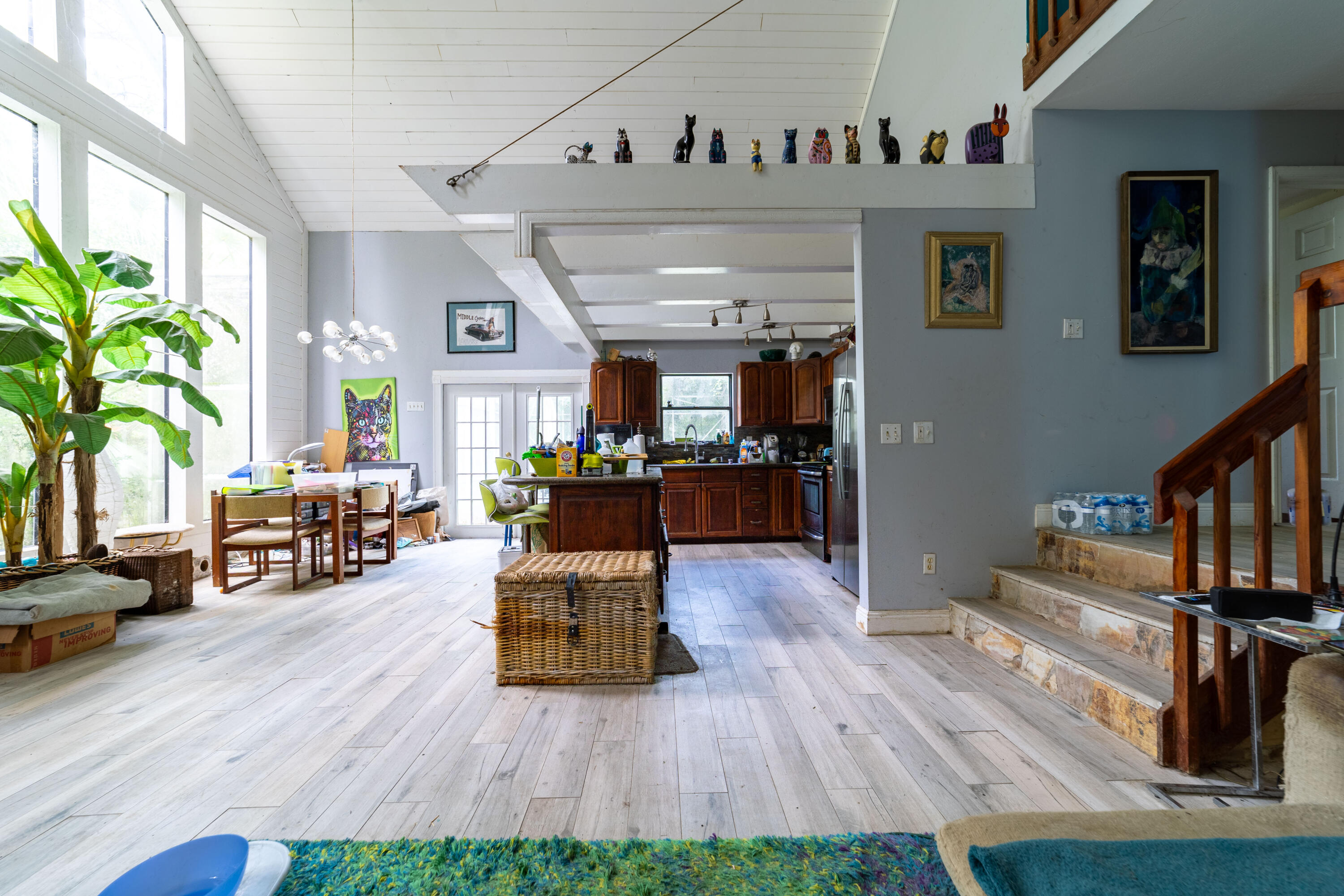 15184 Alexander Run Jupiter, FL 33478 - Photo 6 of 35 a living room with furniture and a wooden floor