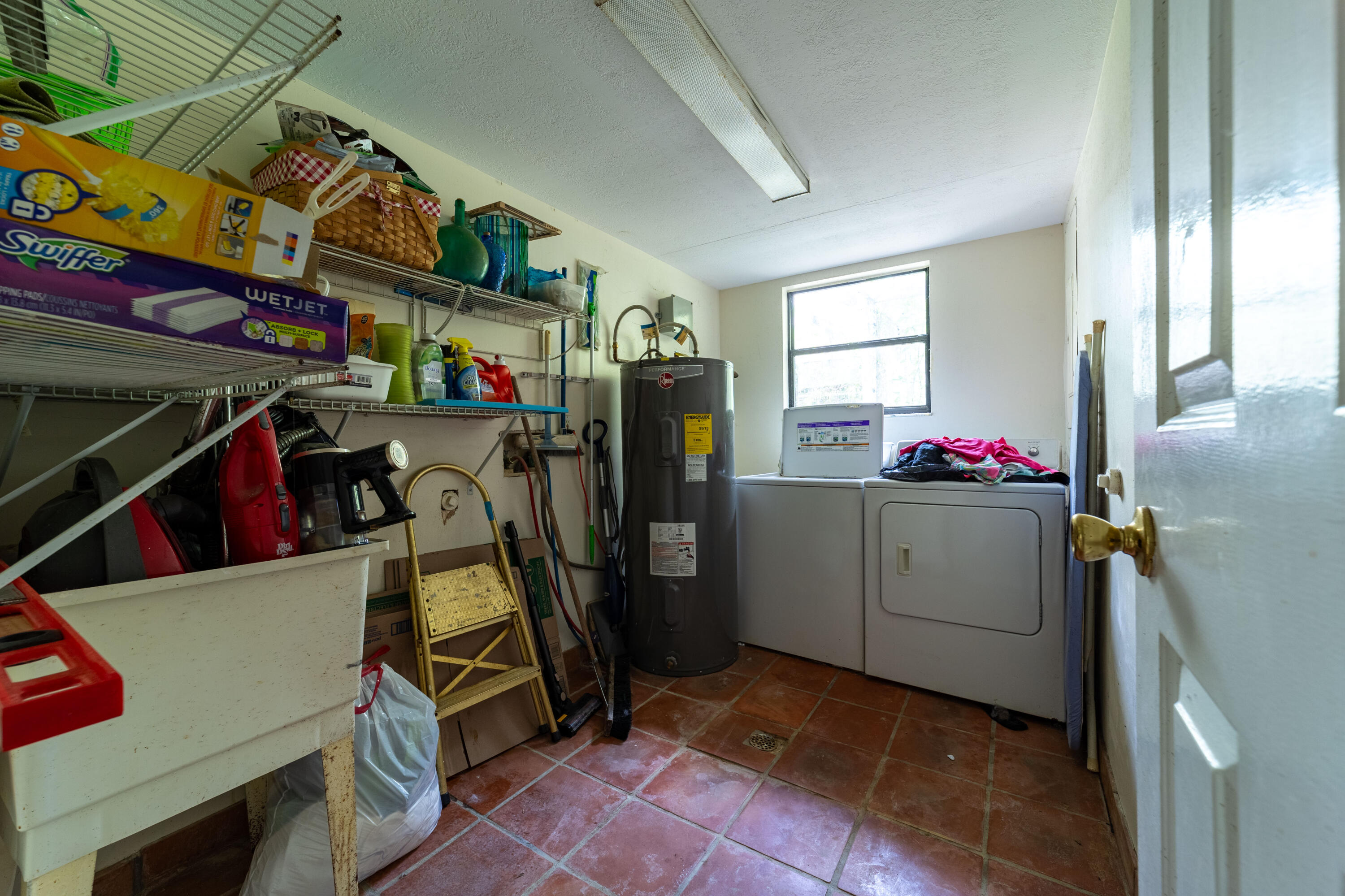 15184 Alexander Run Jupiter, FL 33478 - Photo 9 of 35 a view of storage and utility room