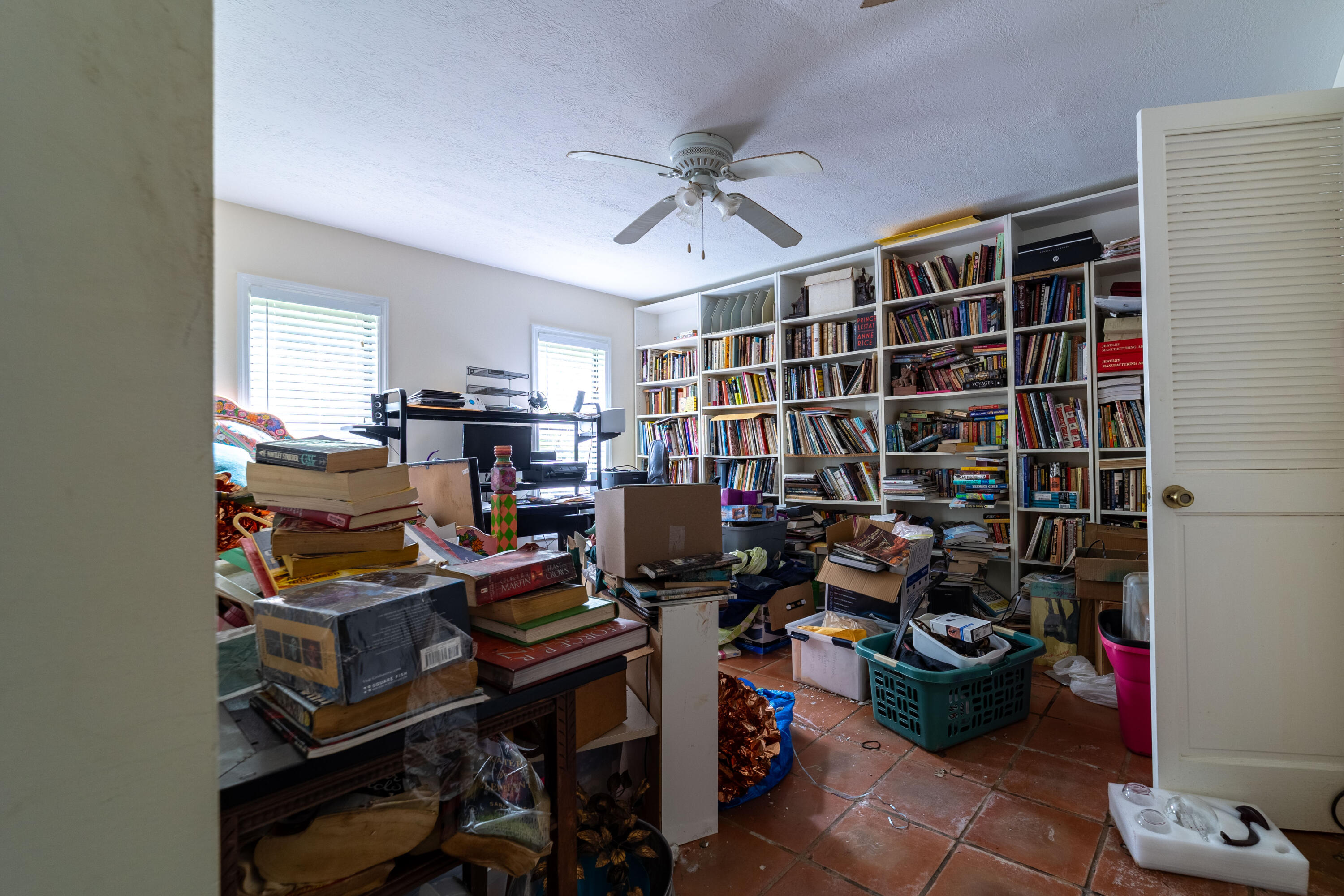 15184 Alexander Run Jupiter, FL 33478 - Photo 10 of 35 a view of a workspace with furniture and a garage