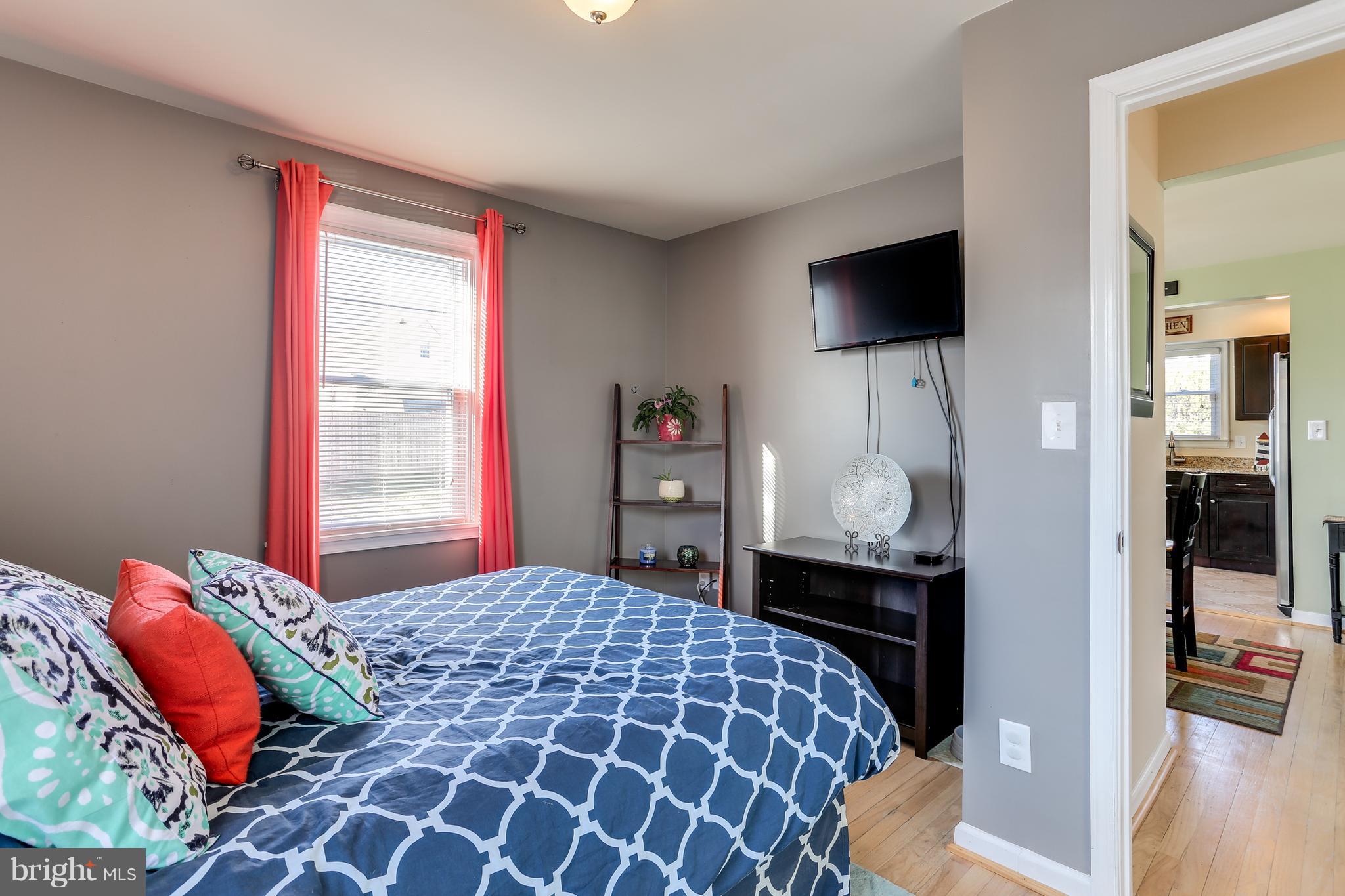 1803 Wendover Road Baltimore, MD 21234 - Photo 15 of 29 1st level master bdrm w/lots of light hdwd floors