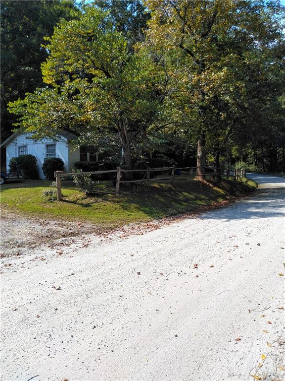 3600 Lake Adger Road Mill Spring, NC 28756 - Photo 3 of 9 a view of a yard with plants and trees