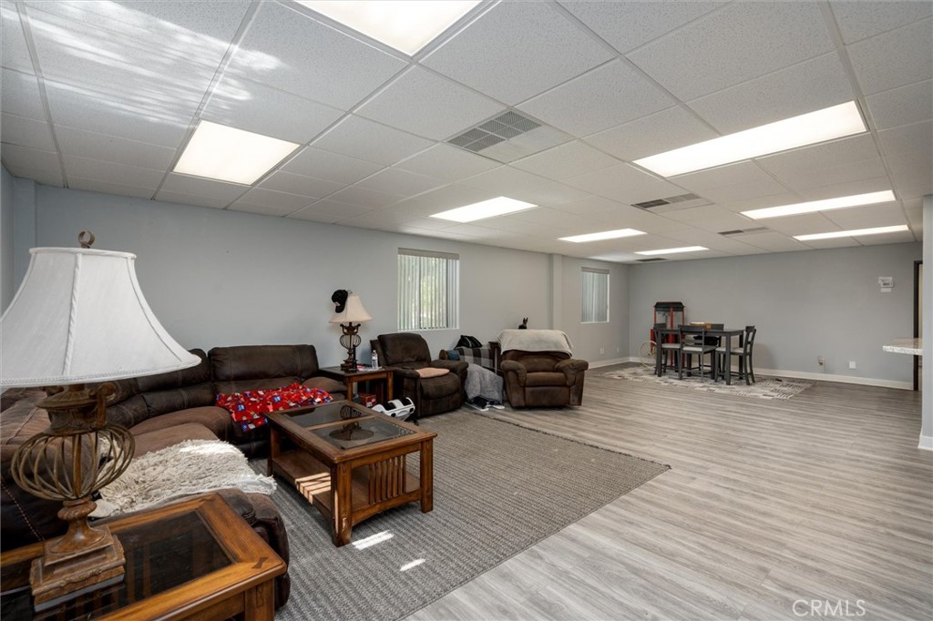 34150 Stowe Road Winchester, CA 92545 - Photo 47 of 80 a living room with furniture and a wooden floor
