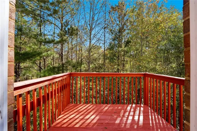 a view of balcony with wooden floor