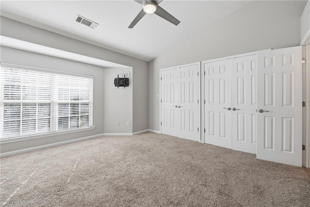 3294 Mill Springs Circle Northeast Buford, GA 30519 - Photo 10 of 22 a view of an empty room with a window