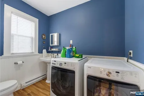 a utility room with a window dryer and washer