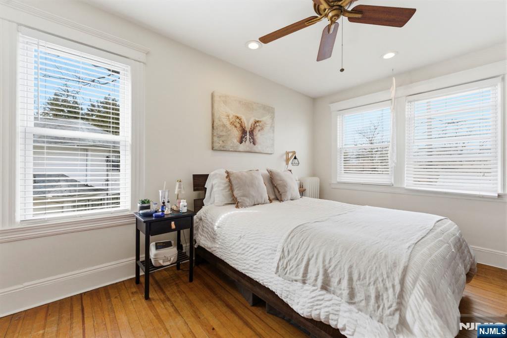 48 Rochelle Avenue Rochelle Park, NJ 07662 - Photo 15 of 30 a bedroom with a bed and a window