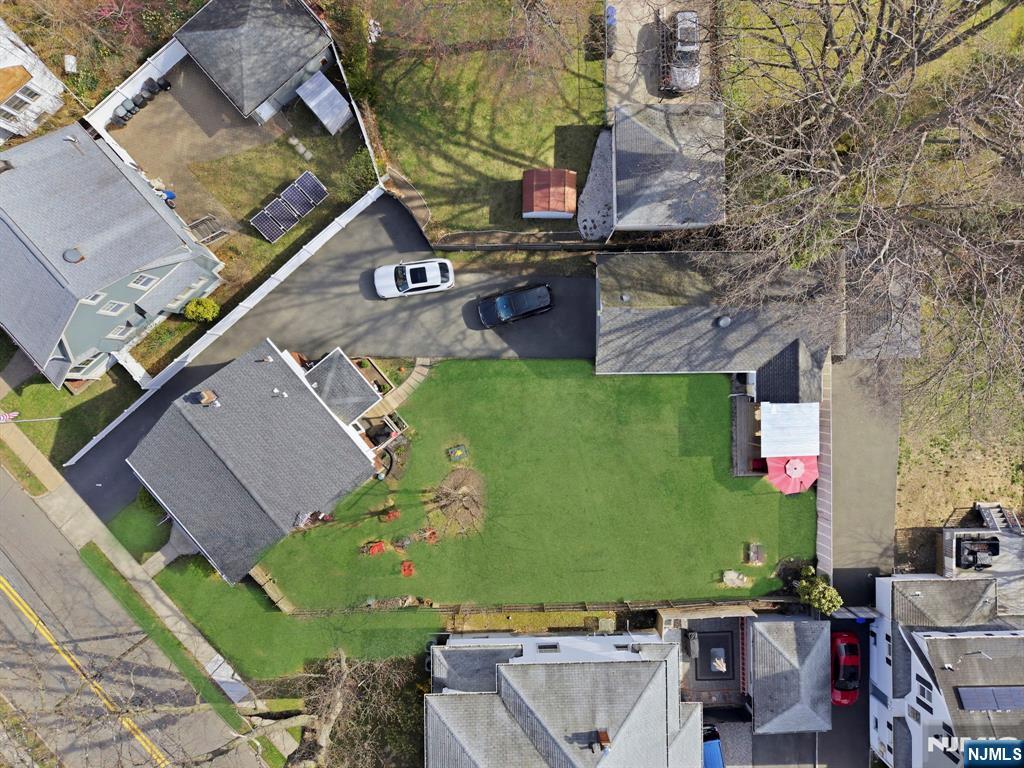 48 Rochelle Avenue Rochelle Park, NJ 07662 - Photo 28 of 30 an aerial view of a house with a yard