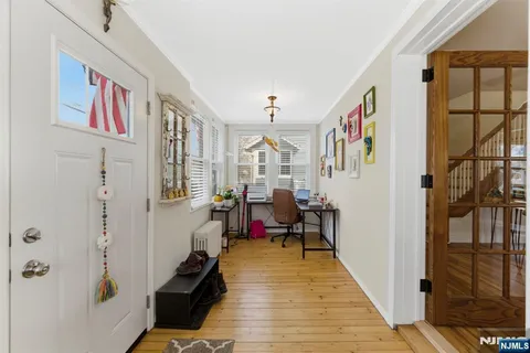 a living room with furniture or couch and a window