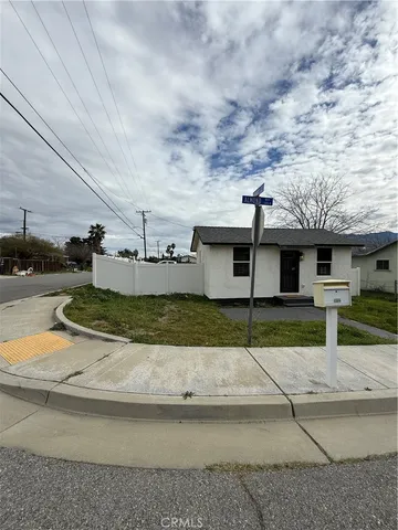 a view of a house with a street