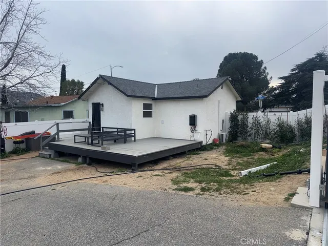 a house view with a garden space