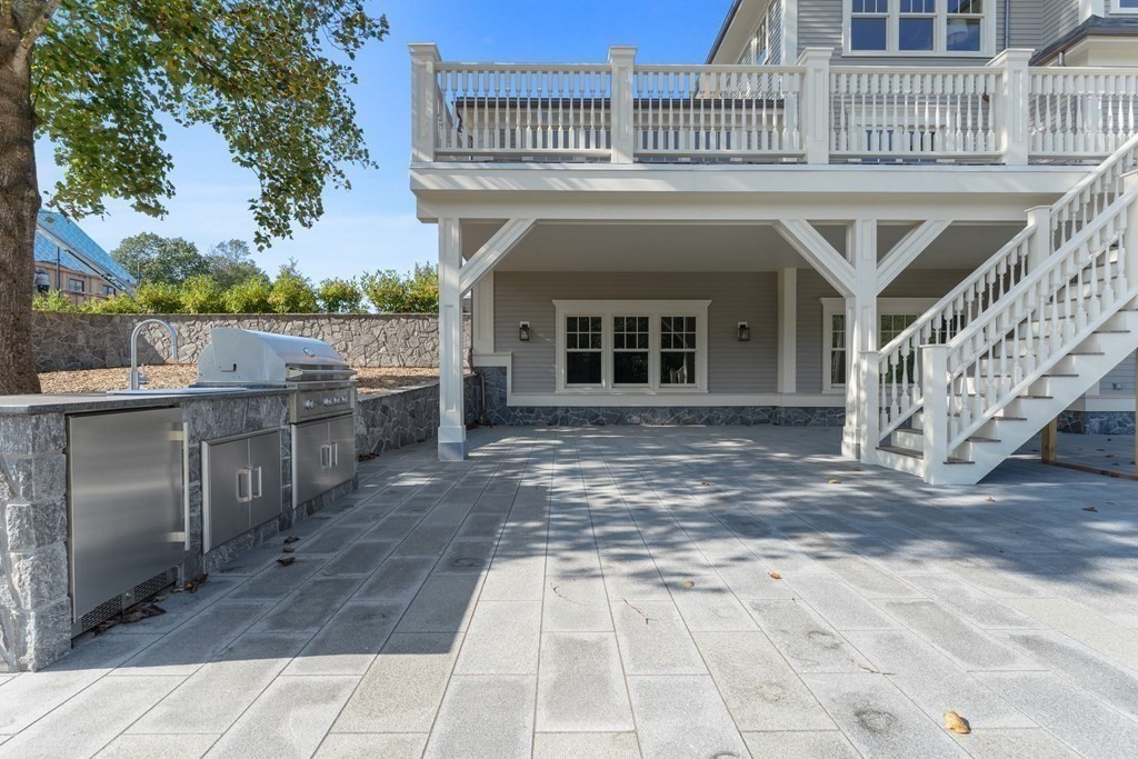 98 Heather Lane Needham, MA 02492 - Photo 11 of 31 a view of a house with a porch