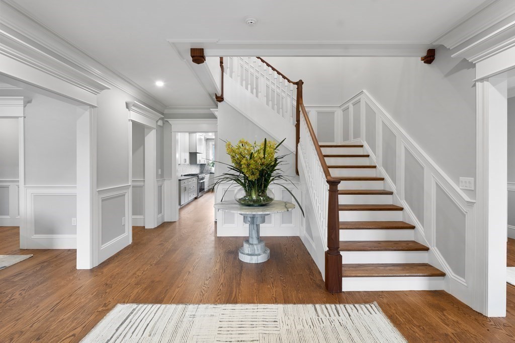 98 Heather Lane Needham, MA 02492 - Photo 13 of 31 a view of entryway and hall with wooden floor