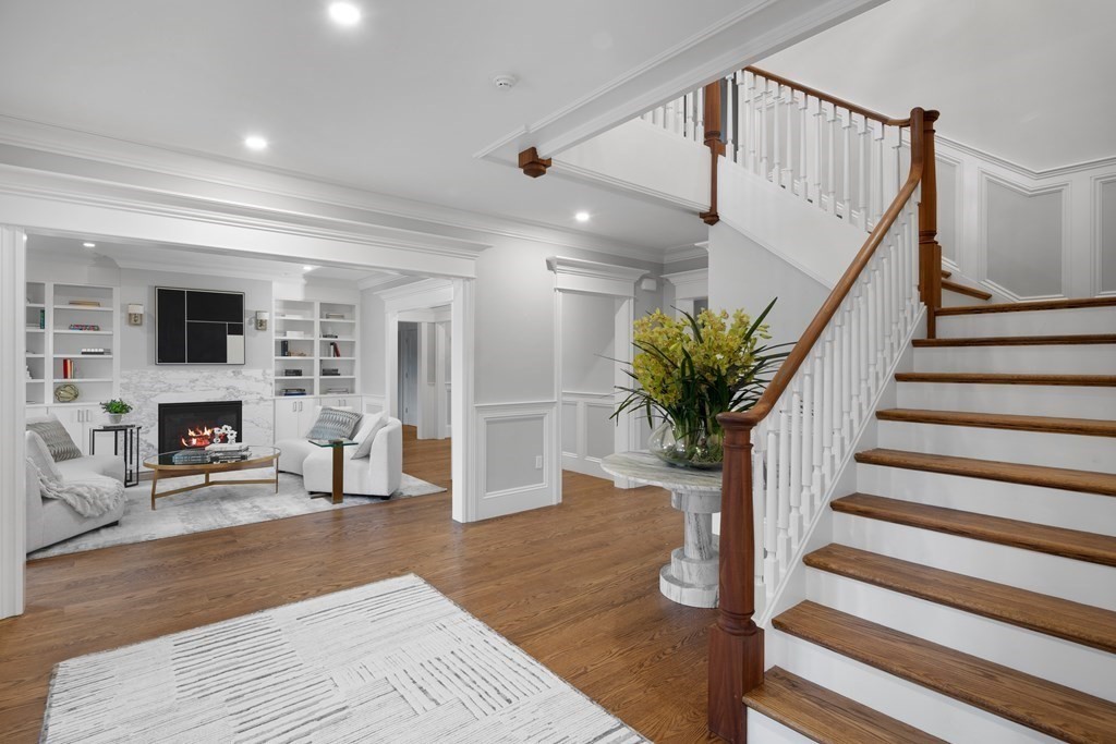 98 Heather Lane Needham, MA 02492 - Photo 14 of 31 a living room with furniture and a fireplace