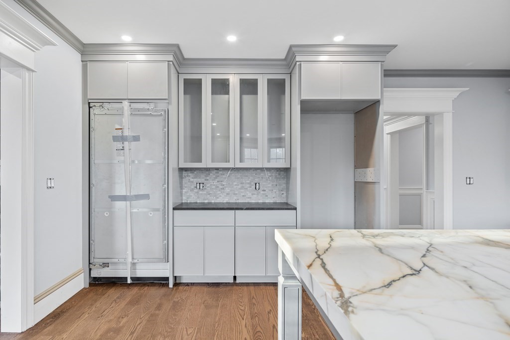 98 Heather Lane Needham, MA 02492 - Photo 20 of 31 a view of a kitchen with white cabinets