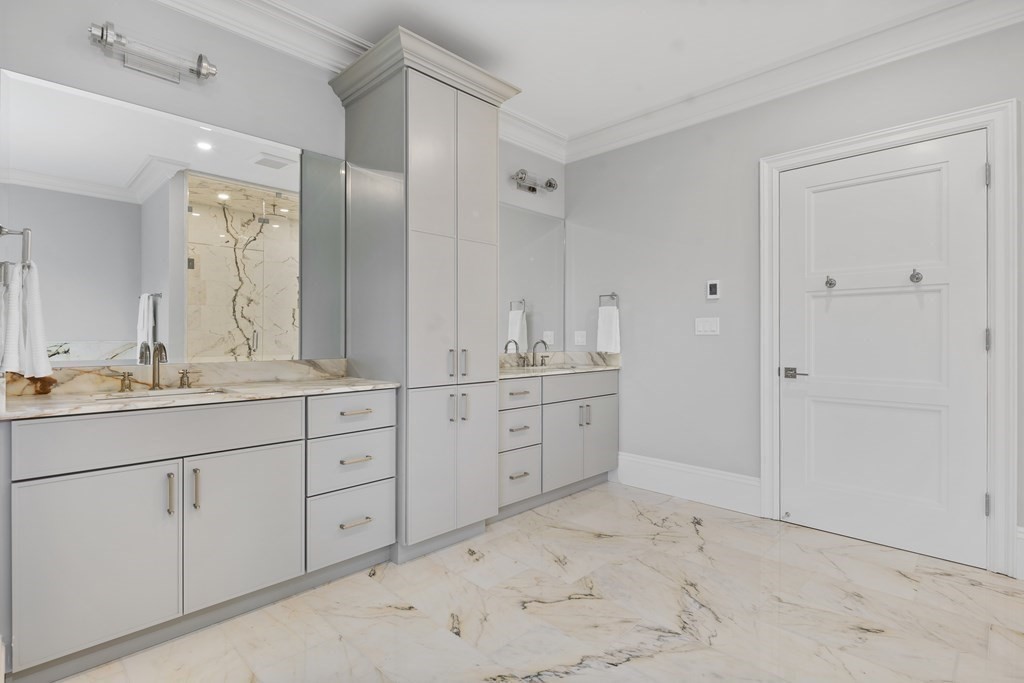 98 Heather Lane Needham, MA 02492 - Photo 27 of 31 a spacious bathroom with double sink and a mirror