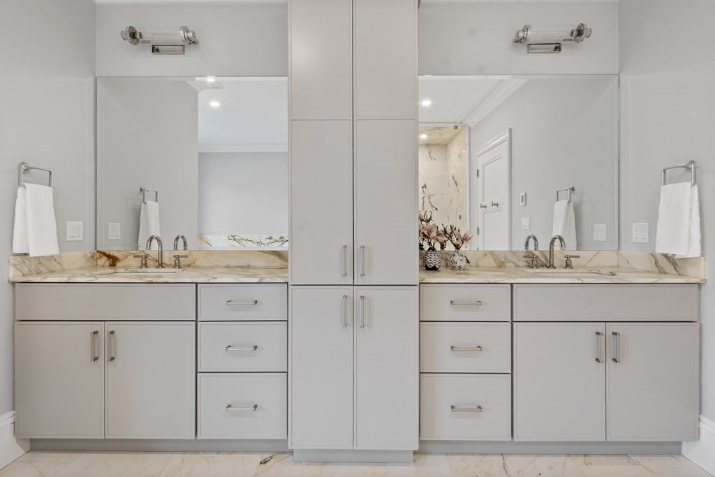 98 Heather Lane Needham, MA 02492 - Photo 28 of 31 a bathroom with double sink and a mirror