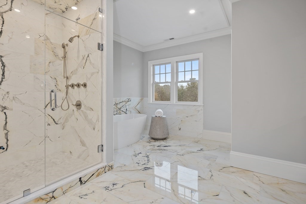 98 Heather Lane Needham, MA 02492 - Photo 29 of 31 a bathroom with a sink and shower