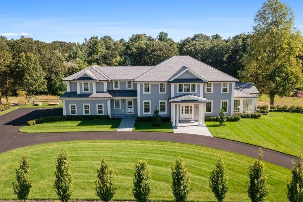 98 Heather Lane Needham, MA 02492 - Photo 6 of 31 a front view of a house with garden and trees