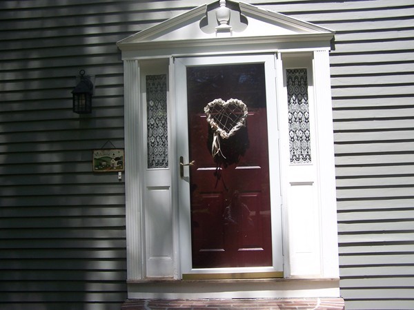 40 Porter Road Boxford, MA 01921 - Photo 16 of 16 a view of porch with a door and a window