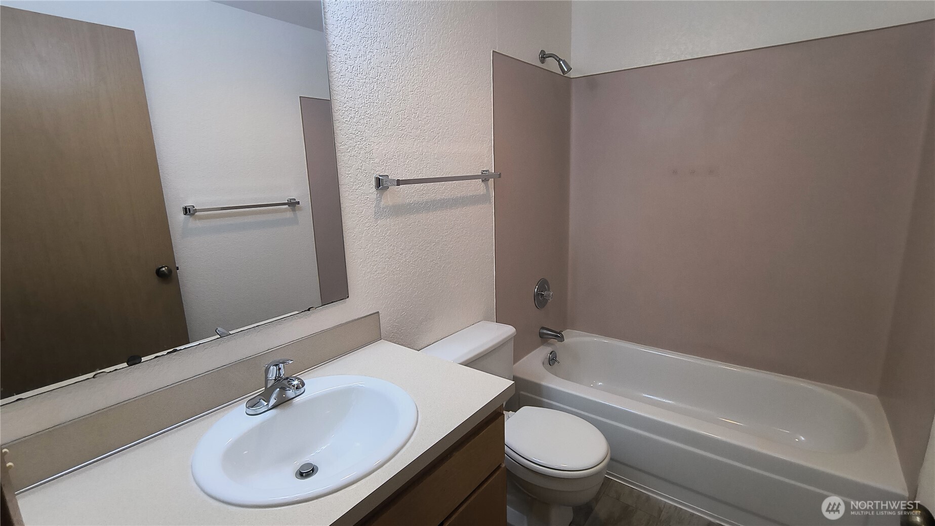 13232 Ambaum Boulevard Southwest Burien, WA 98146 - Photo 16 of 22 a bathroom with a sink toilet and a bathtub