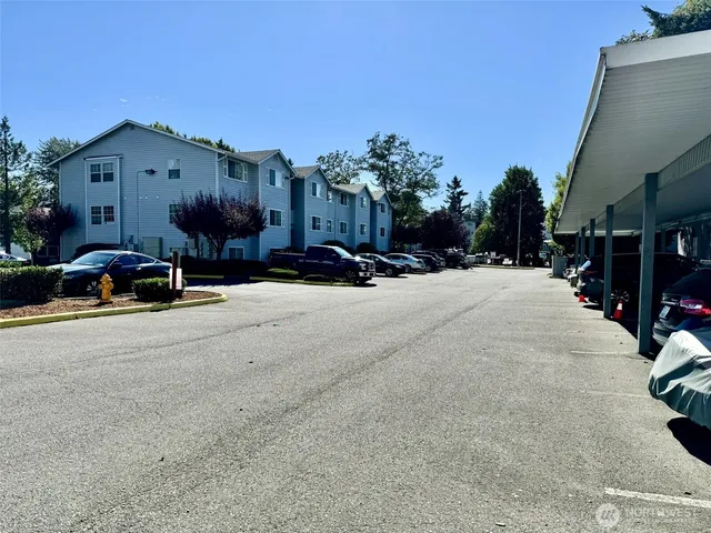 a view of a street with cars