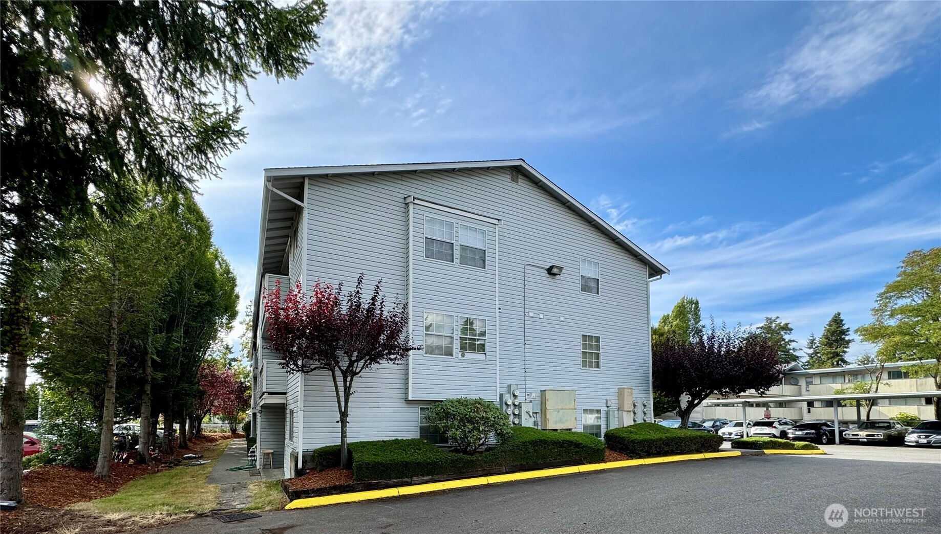 13232 Ambaum Boulevard Southwest Burien, WA 98146 - Photo 7 of 22 a front view of a house with a yard