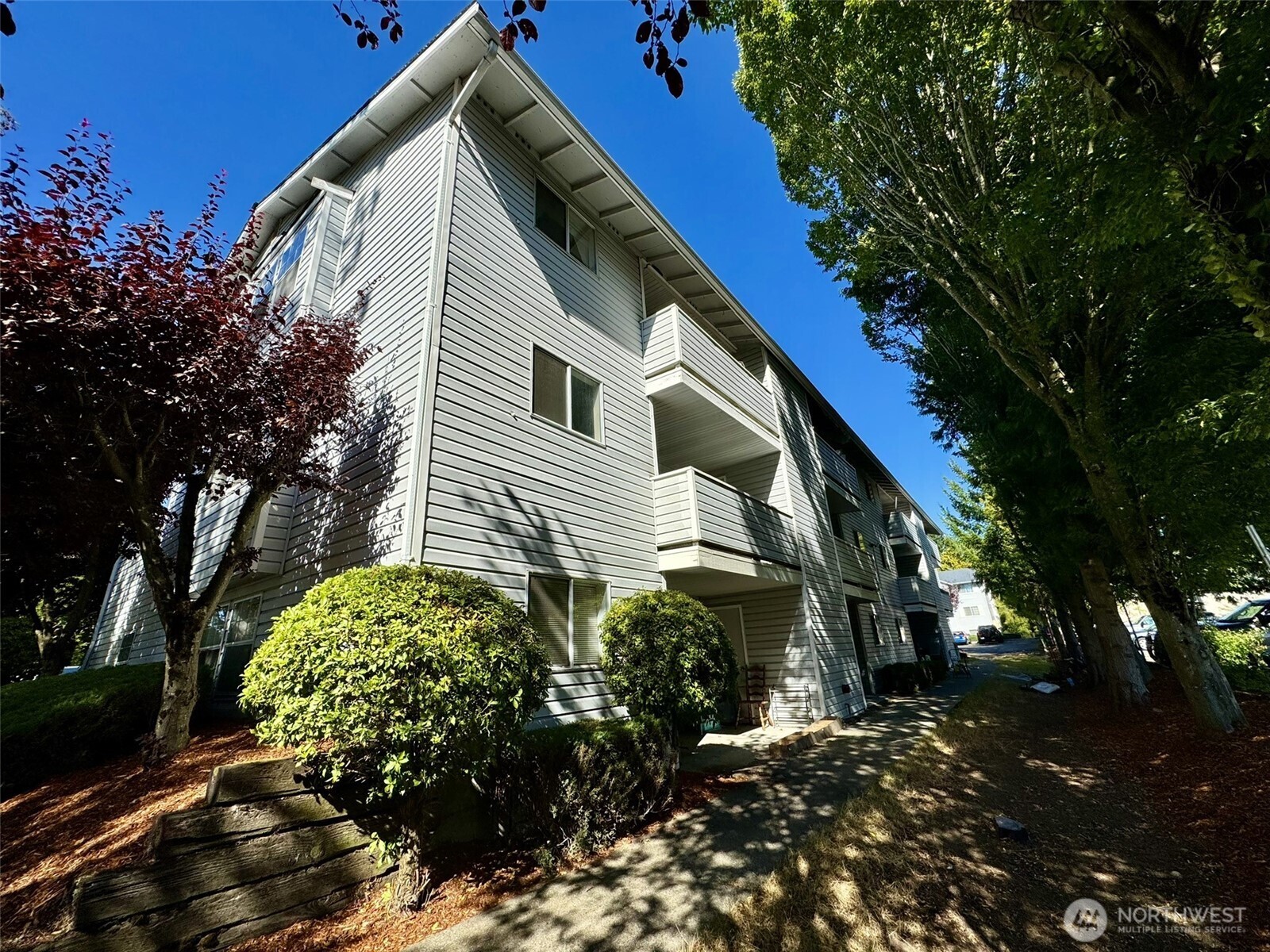 13232 Ambaum Boulevard Southwest Burien, WA 98146 - Photo 9 of 22 a view of a house with a yard