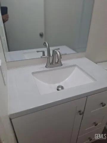 a view of an empty room with a floor to ceiling window