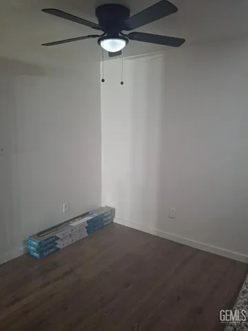 a kitchen with granite countertop cabinets sink and cabinets