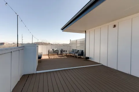 a view of a terrace with wooden floor
