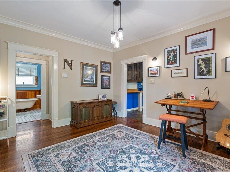793 Rozelle Street Memphis, TN 38104 - Photo 11 of 33 a living room with furniture and wooden floor