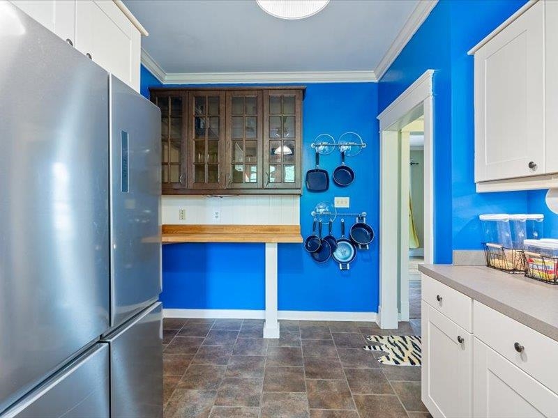 793 Rozelle Street Memphis, TN 38104 - Photo 14 of 33 a view of kitchen with a refrigerator and cabinets