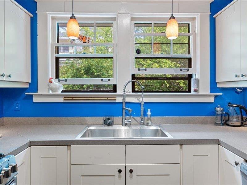 793 Rozelle Street Memphis, TN 38104 - Photo 17 of 33 a kitchen with a sink and a window