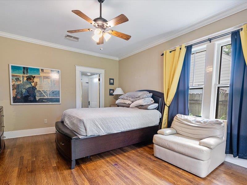 793 Rozelle Street Memphis, TN 38104 - Photo 18 of 33 a bedroom with a bed couch and a window