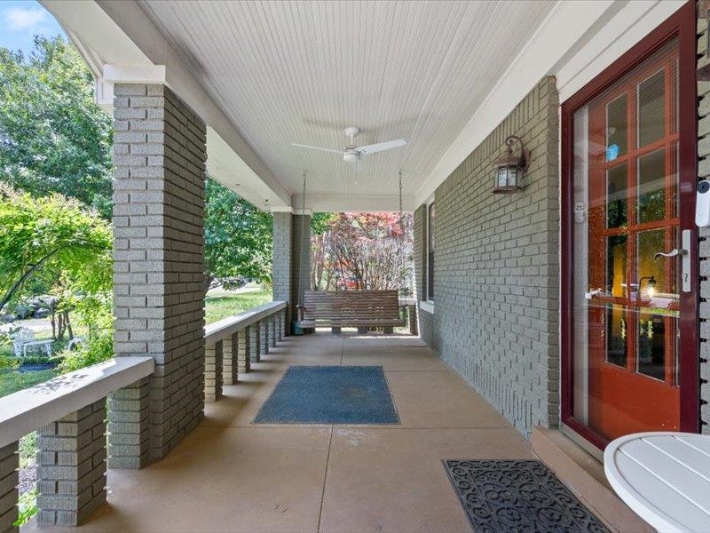 793 Rozelle Street Memphis, TN 38104 - Photo 6 of 33 a view of a balcony with wooden floor