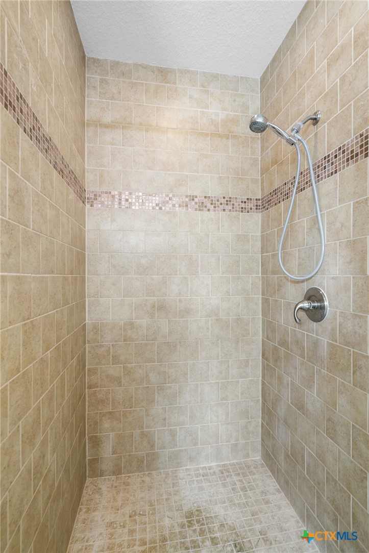 117 Sunset Way Port Lavaca, TX 77979 - Photo 18 of 37 a bathroom with a shower
