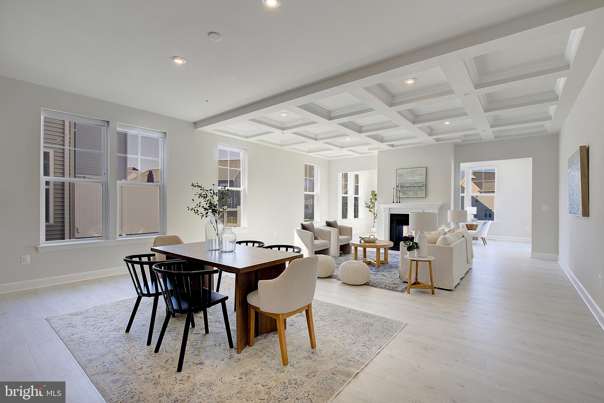 1126 White Clover Lane Odenton, MD 21113 - Photo 11 of 92 a view of a dining room with furniture and wooden floor