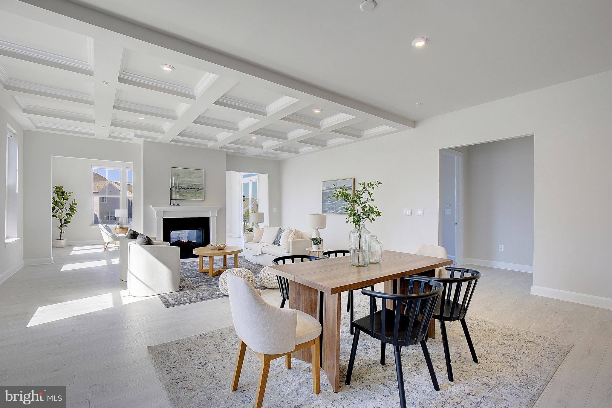 1126 White Clover Lane Odenton, MD 21113 - Photo 12 of 92 a view of a dining room with furniture and a potted plant