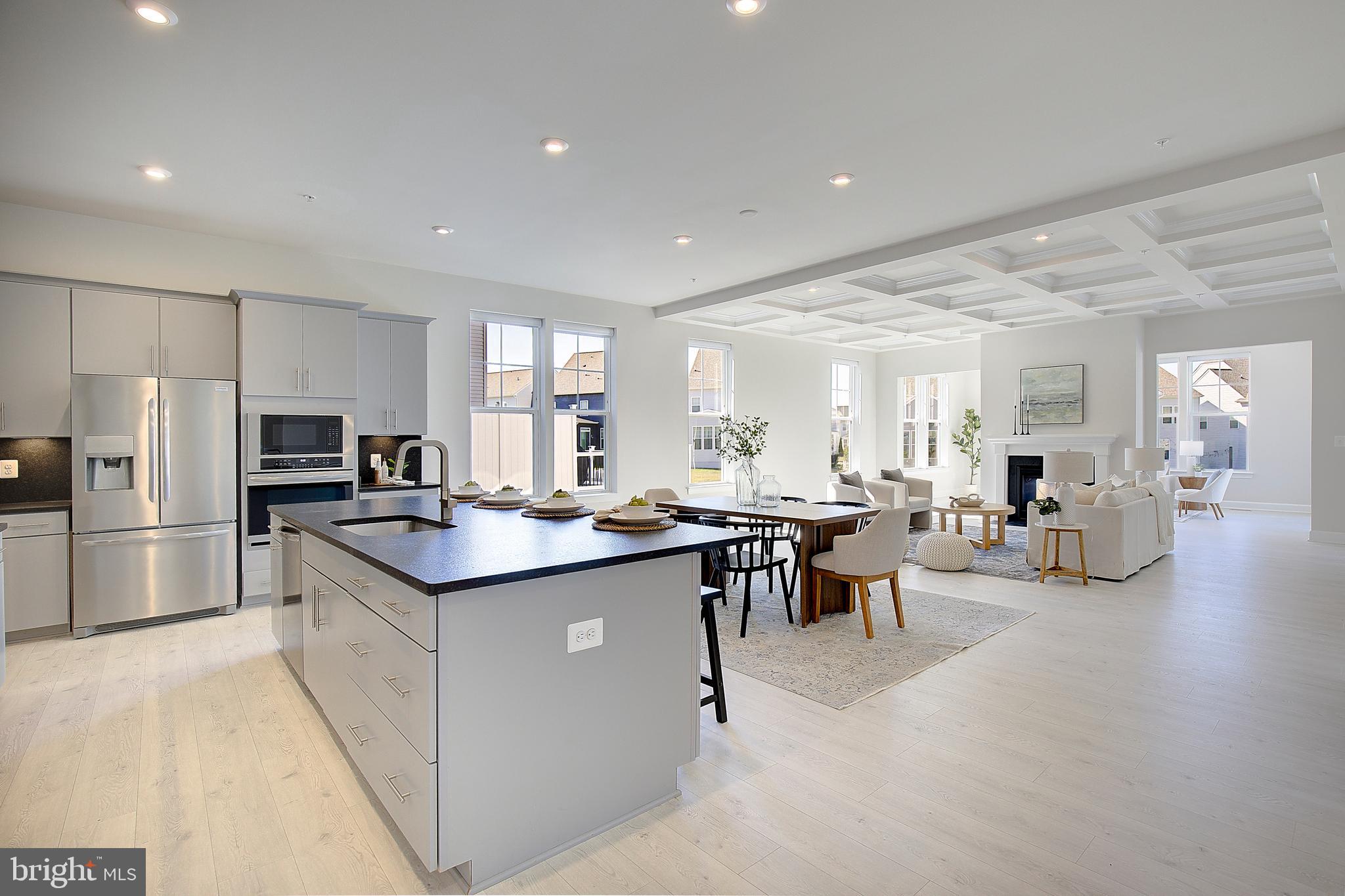 1126 White Clover Lane Odenton, MD 21113 - Photo 17 of 92 a kitchen with counter top space sink stove and refrigerator