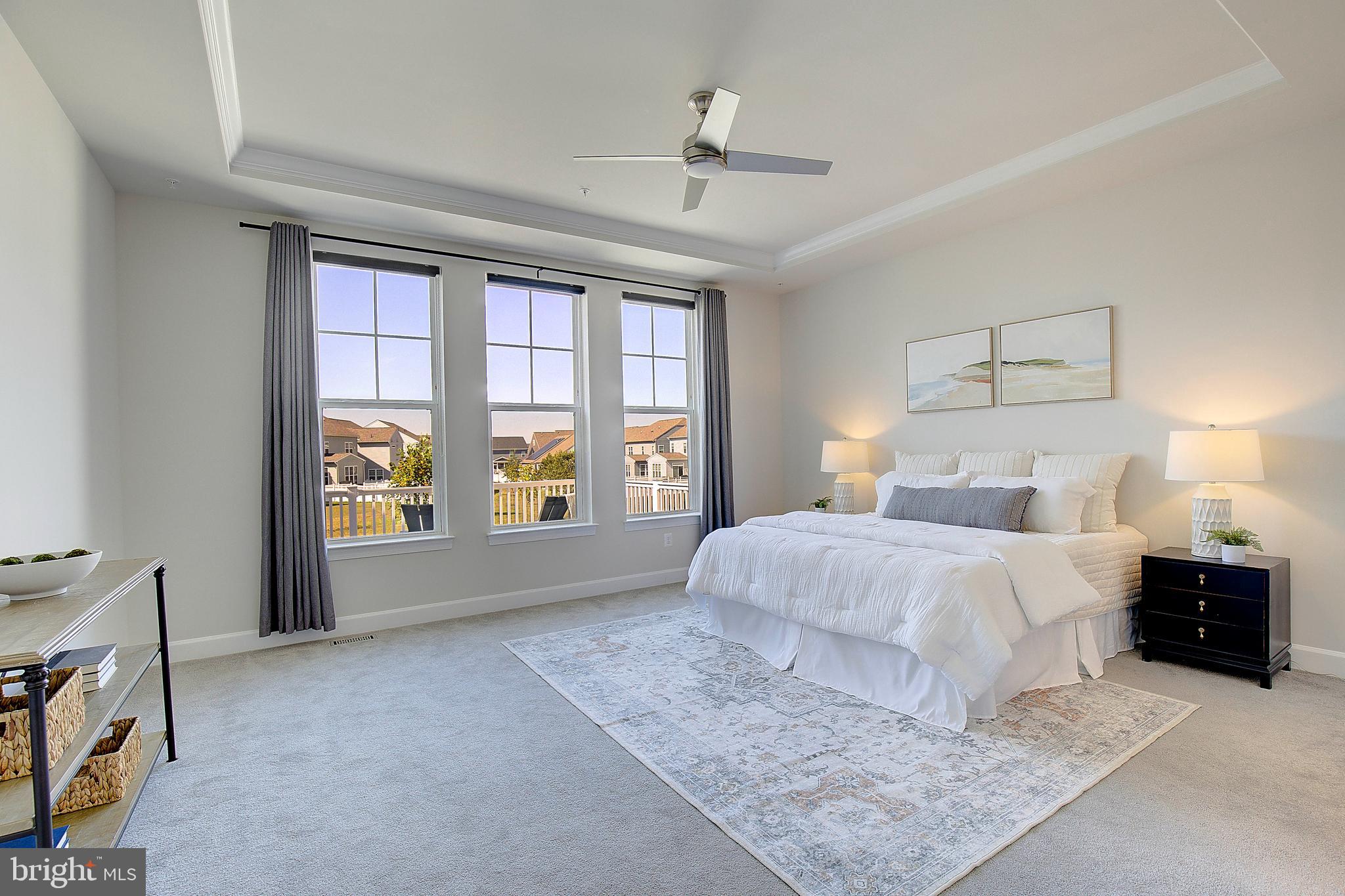 1126 White Clover Lane Odenton, MD 21113 - Photo 31 of 92 a spacious bedroom with a large bed and a window