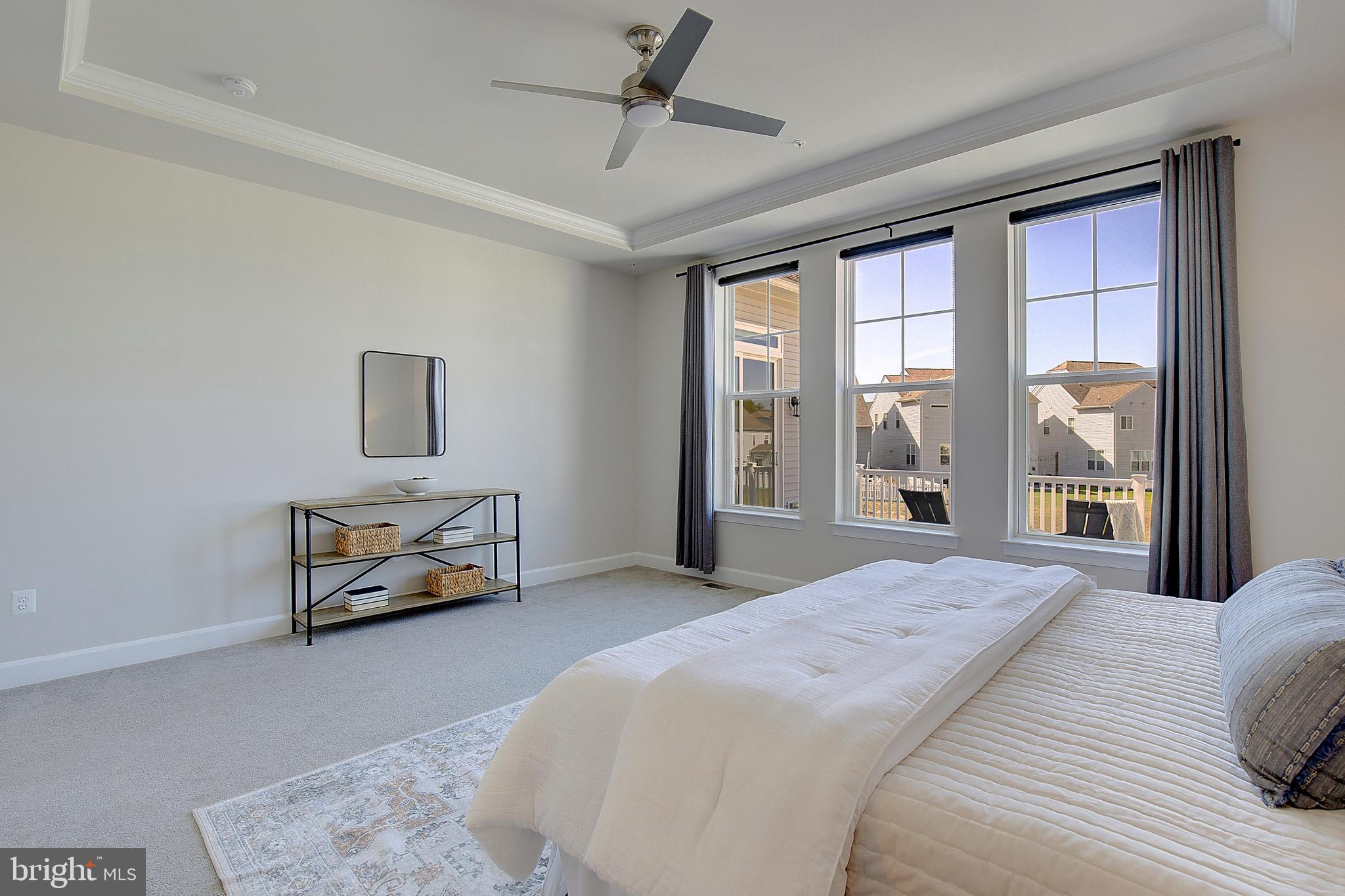 1126 White Clover Lane Odenton, MD 21113 - Photo 32 of 92 a bedroom with a bed a large window and couch