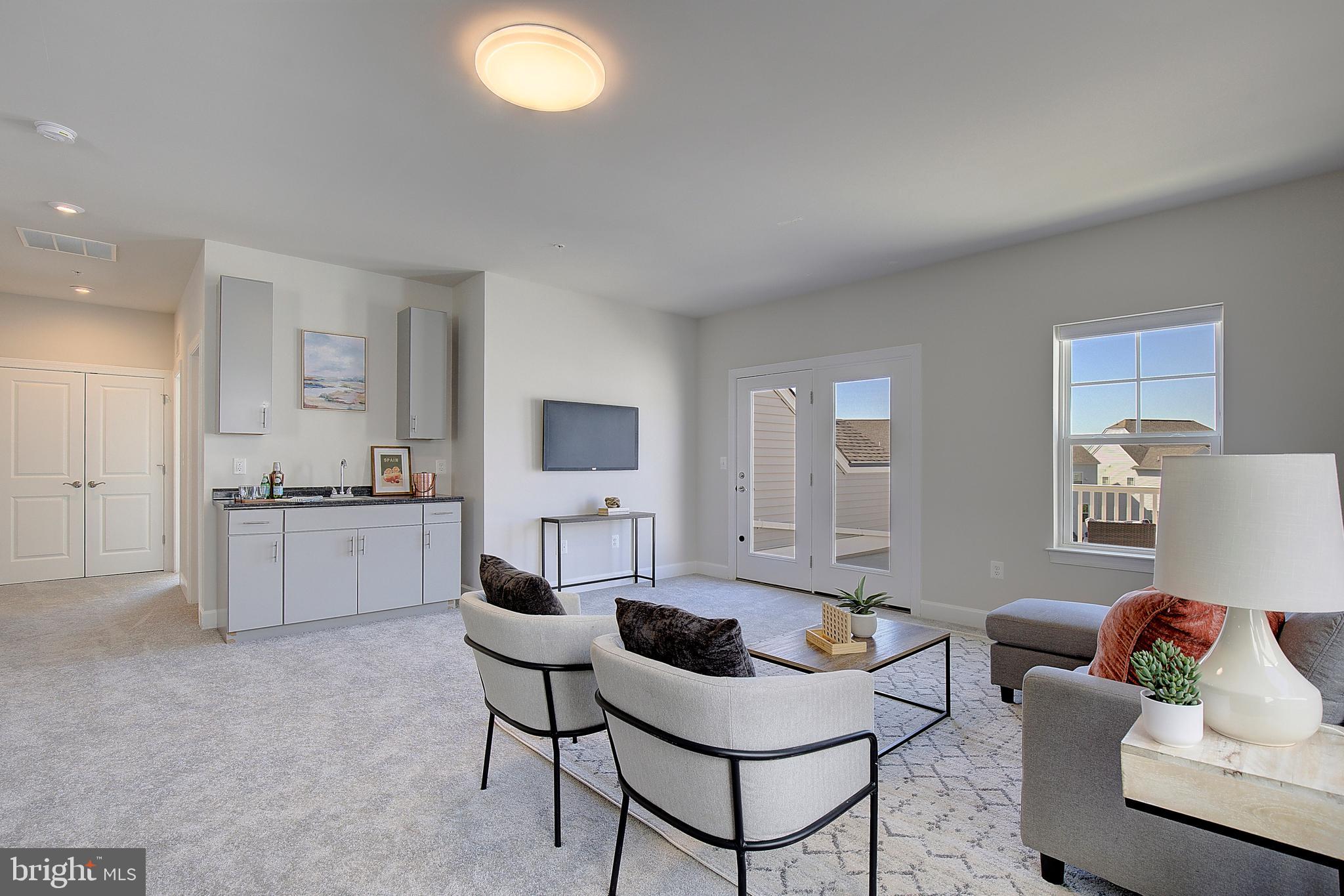 1126 White Clover Lane Odenton, MD 21113 - Photo 37 of 92 a living room with furniture and a table