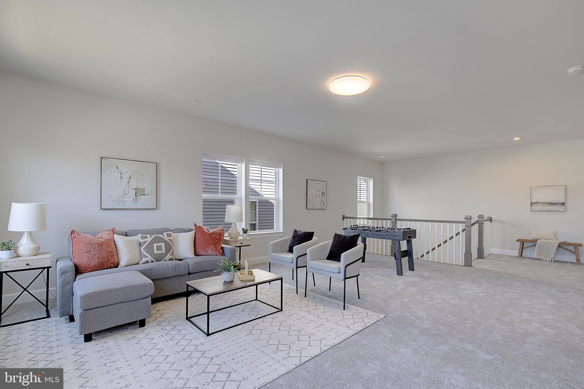 1126 White Clover Lane Odenton, MD 21113 - Photo 40 of 92 a living room with furniture and a large window