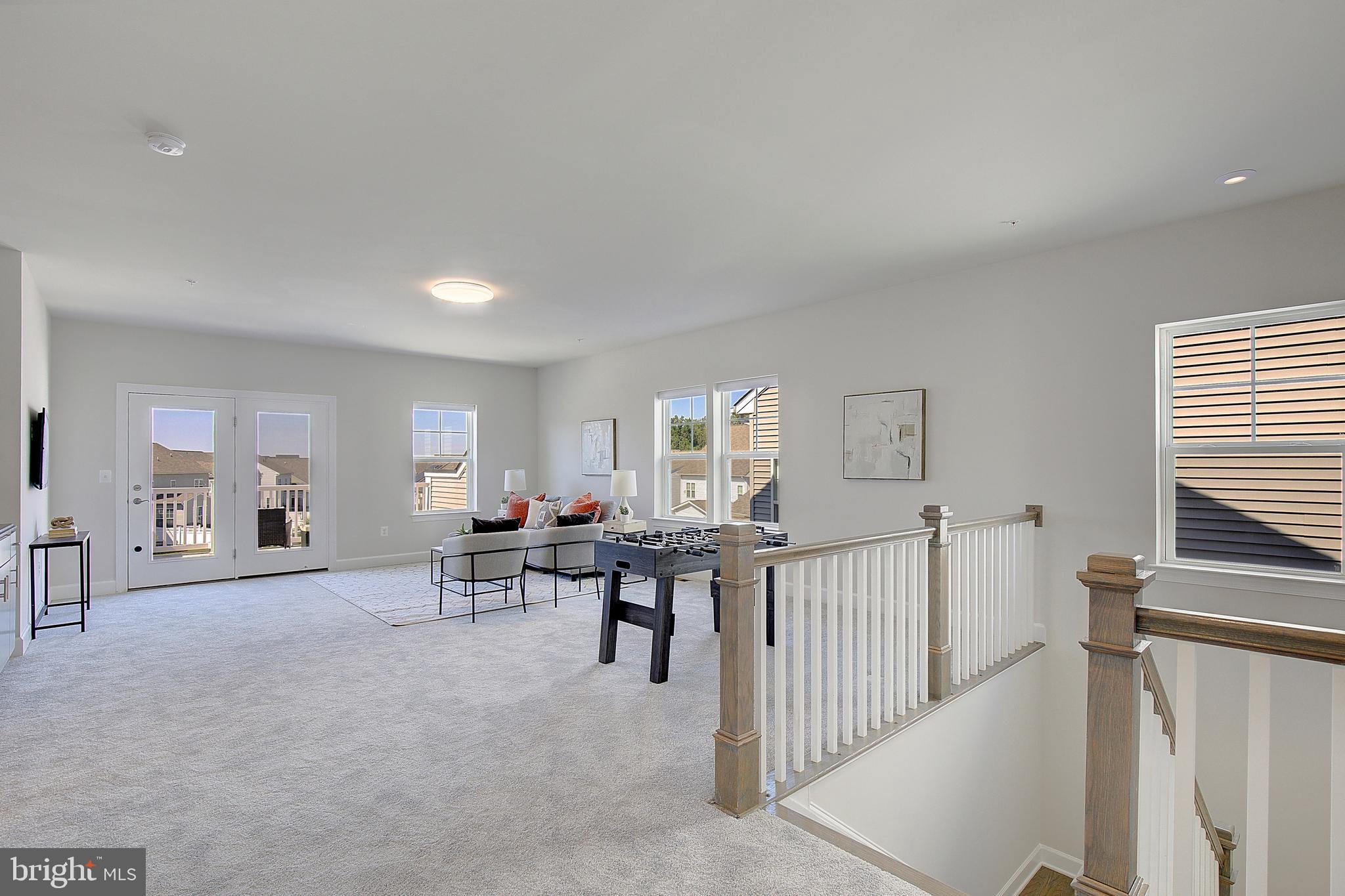 1126 White Clover Lane Odenton, MD 21113 - Photo 42 of 92 a living room with furniture and a table