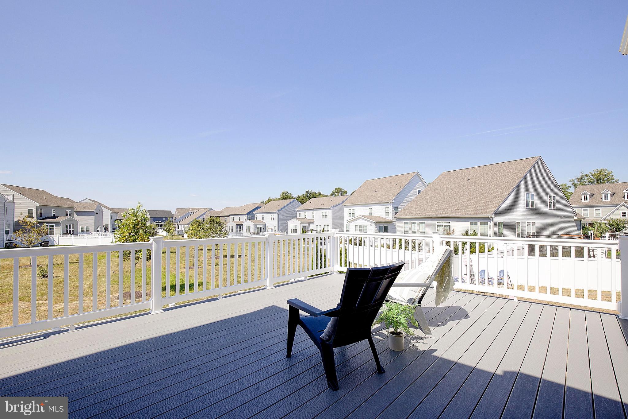1126 White Clover Lane Odenton, MD 21113 - Photo 59 of 92 a view of a balcony with lake view and wooden floor