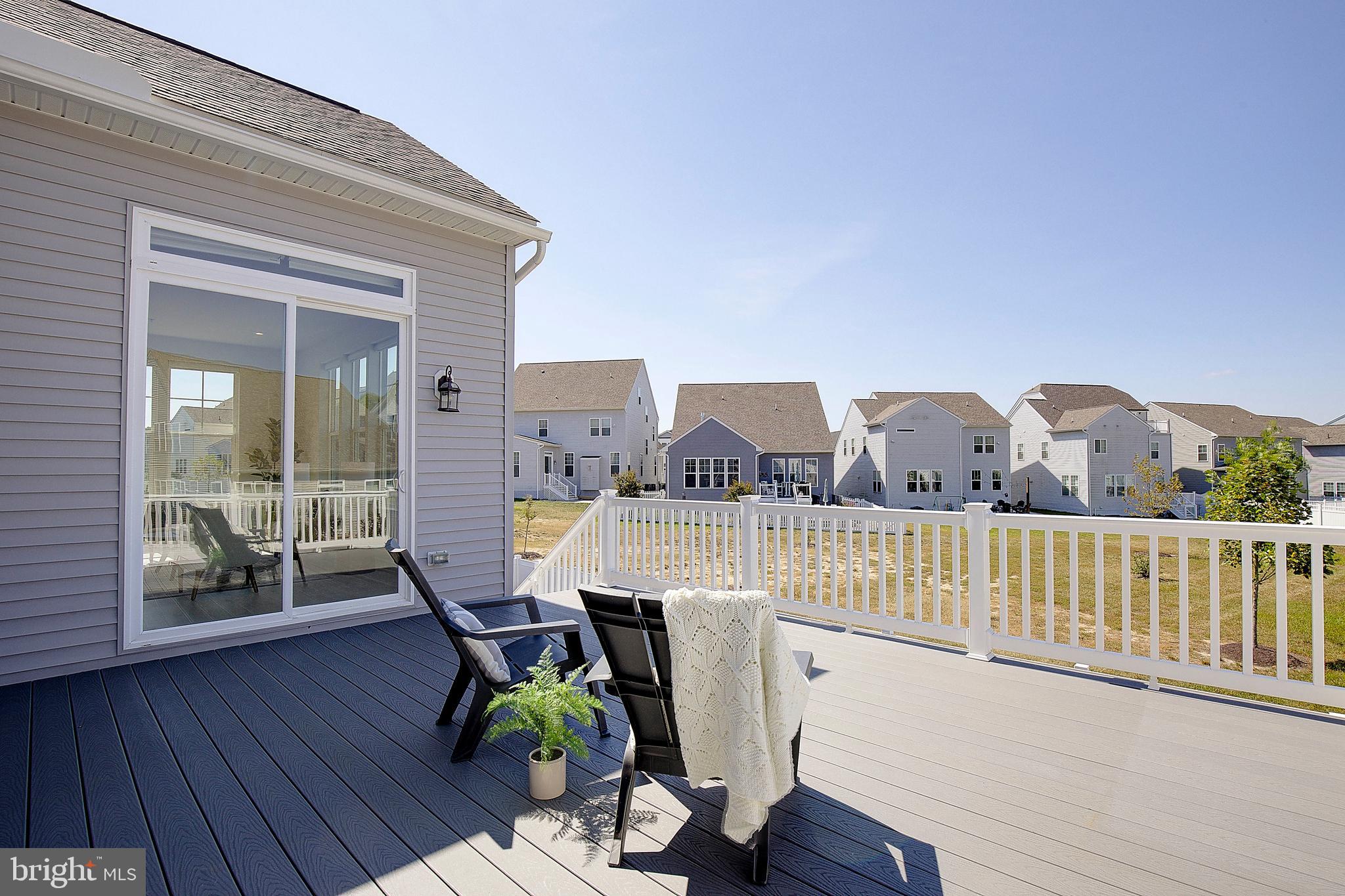 1126 White Clover Lane Odenton, MD 21113 - Photo 61 of 92 a living room with furniture a wooden floor and windows